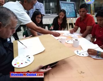 Joel Ramos en el Día Munidal del Pintor con Boca y Pie